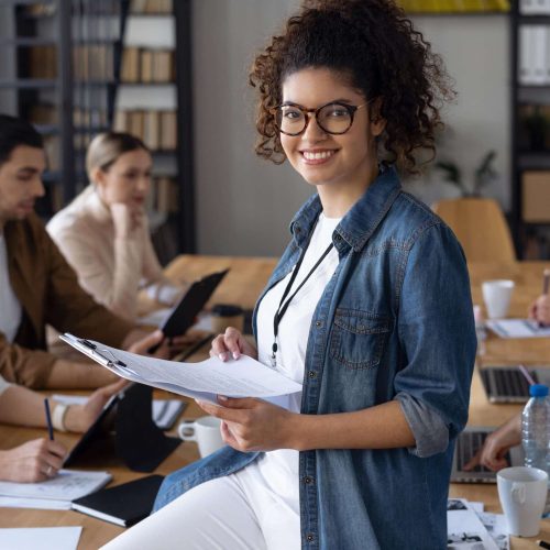 Business people in English conference room